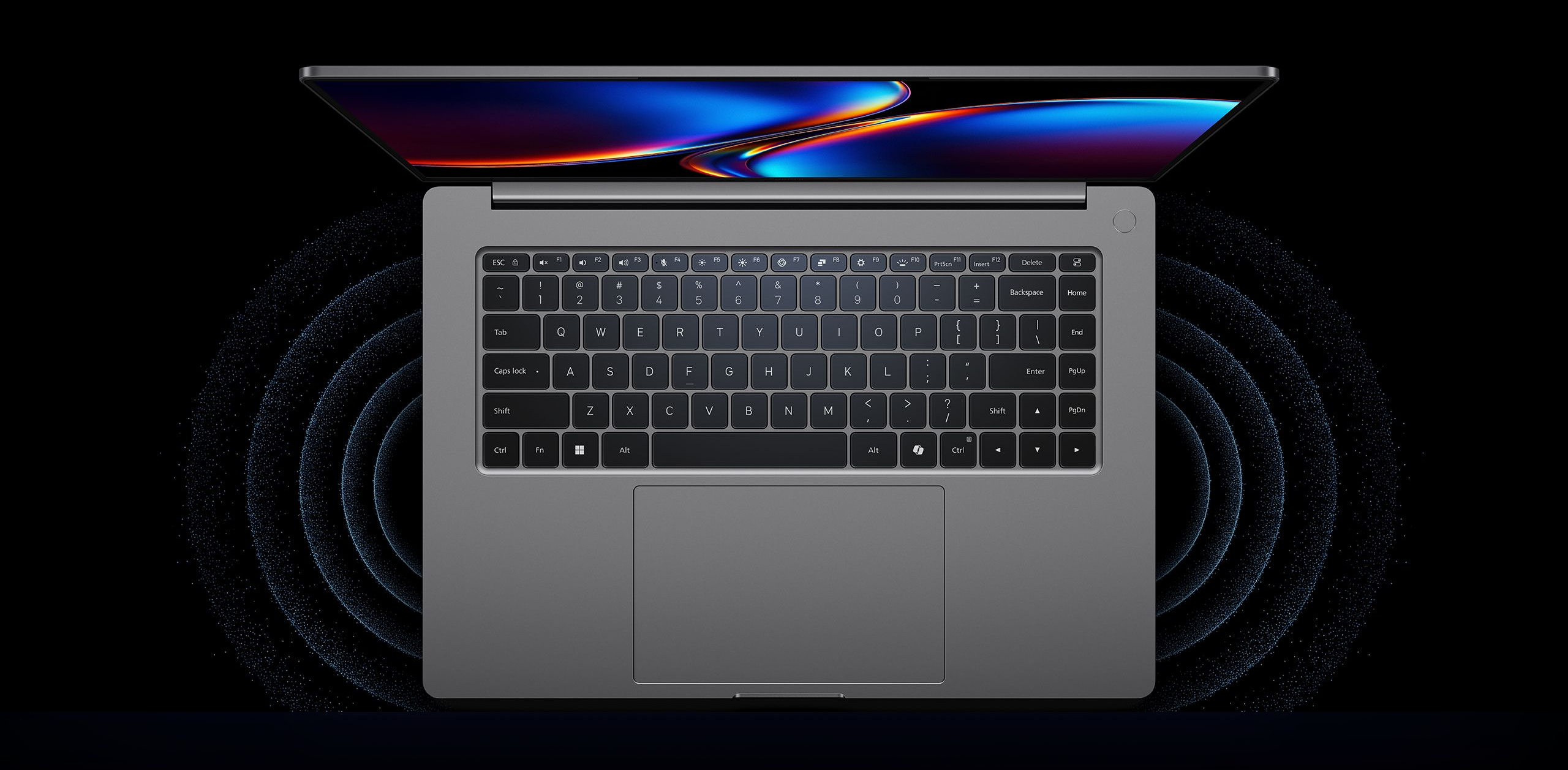 Widok z gory pelnej klawiatury i duzego touchpada Xiaomi Redmibook 16 Pro 2026
